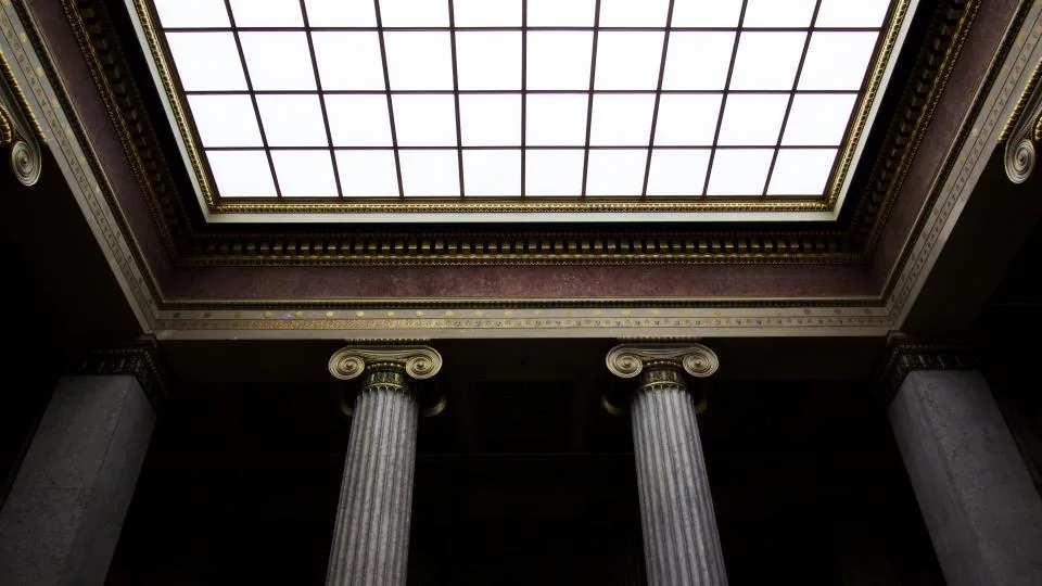 The skylit hall outside the admissions office